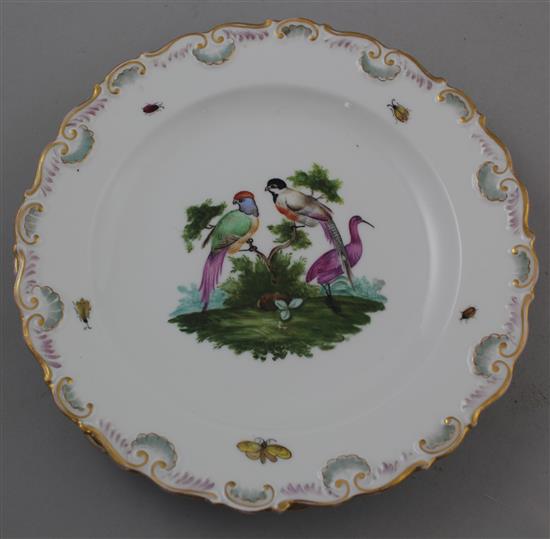 Two Meissen outside decorated plates and a similar Berlin outside decorated plate, 21.5cm